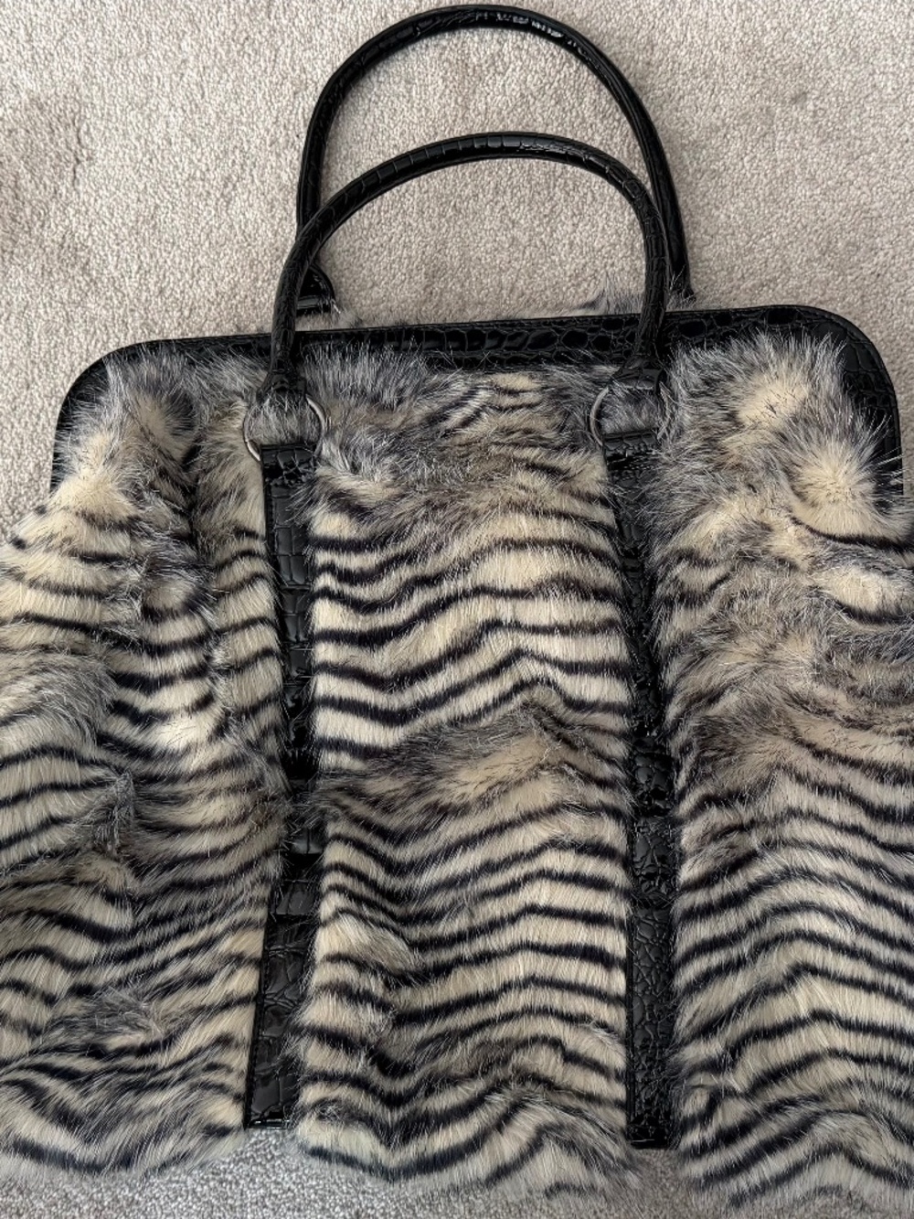 Donna’s Fabulous Furs Zebra weekender bag with black handles